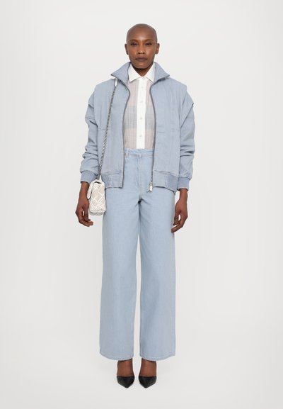 REMAIN COCOON PANTS - Široke nogavice - light blue