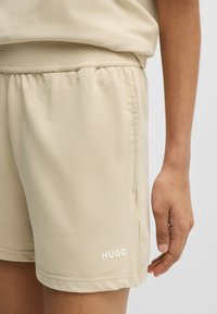 HUGO SHUFFLE - Pyjamahousut/-shortsit - light beige