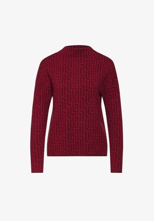 Pull bordeaux à manches longues et cintré avec un motif géométrique en forme de labyrinthe dans une teinte légèrement plus foncée.