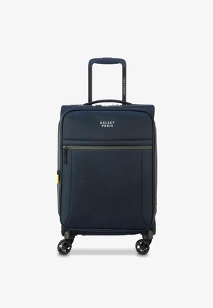 Maleta blanda de color azul marino con un mango retráctil, ruedas suaves, bolsillo delantero con cremallera y el logo de Delsey Paris en la parte frontal.