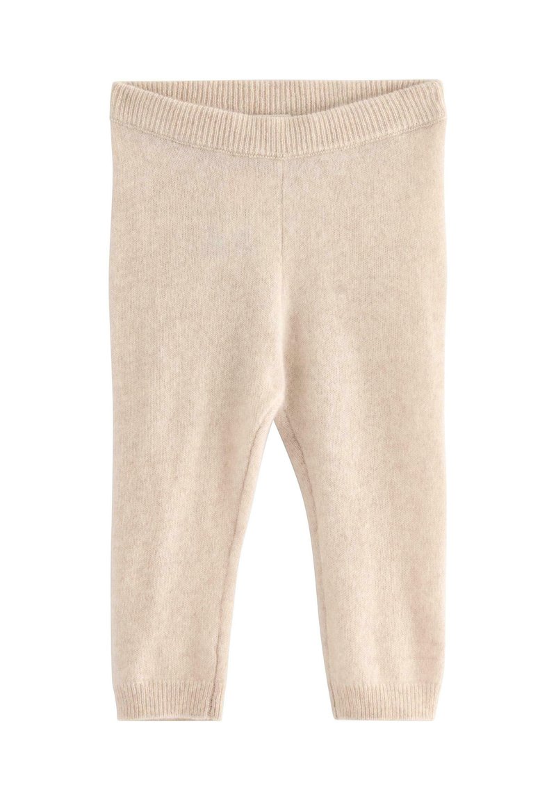 Pantaloni per bambini in maglia beige con vita e polsini a coste, tessuto morbido e testurizzato, progettati per comfort e calore.