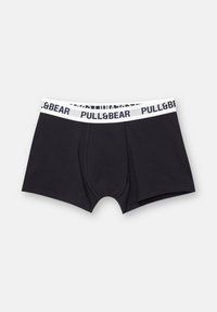 Fekete boxer alsónadrág puha pamutból, fehér elasztikus derékrésszel, amelyen fekete felirat olvasható: "PULL&BEAR". Elöl zsebes kialakítással.