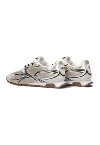 Sneakers with a mesh and silver synthetic upper, featuring black accents and a patterned design. Light sole with a brown rubber tread.
