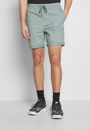 OVER DYED - Shorts - teal