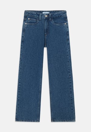 Modré džínsy s rovnými nohavicami, piatimi vreckami a zapínaním na gombík. Tkanina má mierne vyblednutú štruktúru.