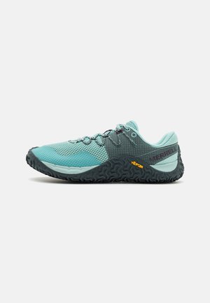 Aqua mesh low-top shoe with black rubber sole, textured accents, and Vibram branding. Features laces and a cushioned collar.