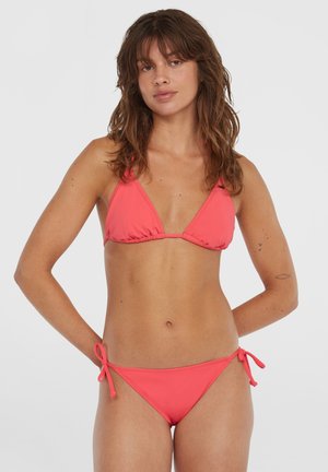 Coral bikini set featuring a triangular top with ruffled edges and adjustable straps, paired with a low-rise bottom and tie sides. Smooth texture.