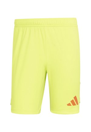 Pantaloni sportivi giallo brillante realizzati in materiale leggero, con vita elasticizzata e un logo arancione in basso a sinistra.