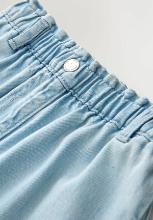Light blue denim shorts featuring an elastic waistband, a silver button closure, and visible stitching details. Smooth texture and casual design.