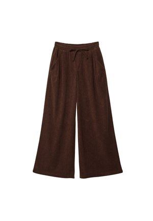 Brune vidde kordbuksbukser med elastisk talje og snor, med sidelommer på hvid baggrund.