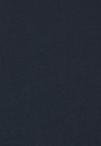 Tissu bleu marine foncé avec une texture tricotée serrée et lisse.