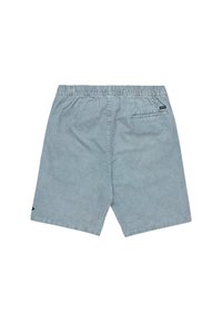 Light blue shorts made of soft fabric. Features an elastic waistband, single back pocket, and a small logo detail on the side.