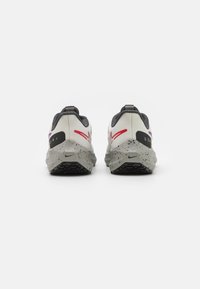 Nike Performance Chaussures de running sur route - beige