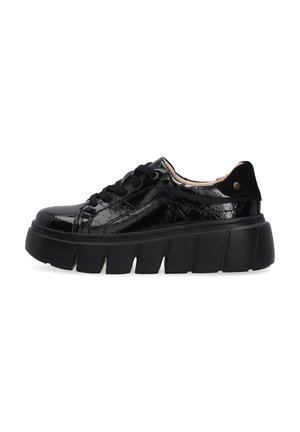 Black shiny leather platform sneaker with thick segmented sole and black laces, viewed from the outer side on a white background.