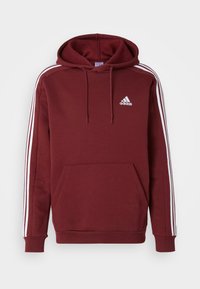 adidas Sportswear ESSENTIALS STRIPES Hoodie shadow red/red