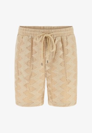 Beige gebreide short met zigzag opengewerkte patroon, elastische tailleband en trekkoord aan de voorkant.