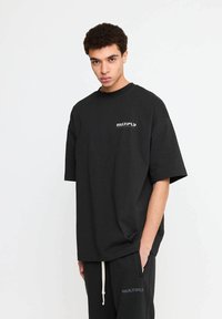Multiply Apparel BROKEN IDENTITY - Printtipaita - black soda washed
