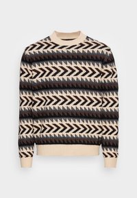 Pull en tricot avec un col rond, motif géométrique en zigzags multicolores marron, beige et noir sur fond crème.