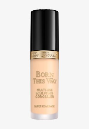 Too Faced Born This Way multi-use sculpting concealer bottle with black cap and gold band, labeled for super coverage.