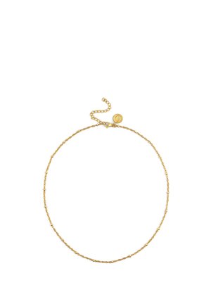 Collar delicado de cadena de oro con pequeños detalles de cuentas y un cierre ajustable que presenta un charm circular.