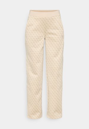 Μπεζ παντελόνι με σχέδιο και υφή, ελαστική μέση και πλαϊνή τσέπη. Το μοτίβο είναι επαναλαμβανόμενο σε όλη την επιφάνεια.