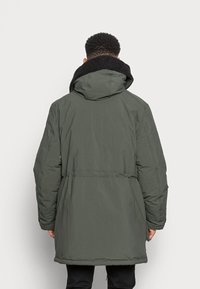 ARKET Casaco de inverno - green