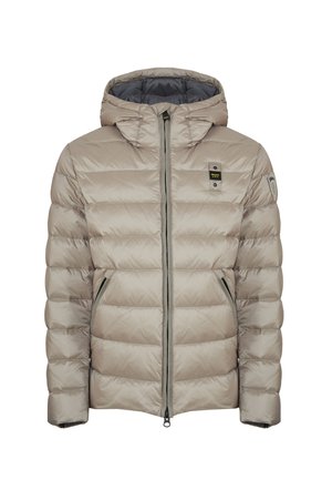 Giacca a vento trapuntata beige chiaro con cappuccio, zipper frontale, due tasche con zipper e piccoli loghi sul petto e sulla manica sinistra.