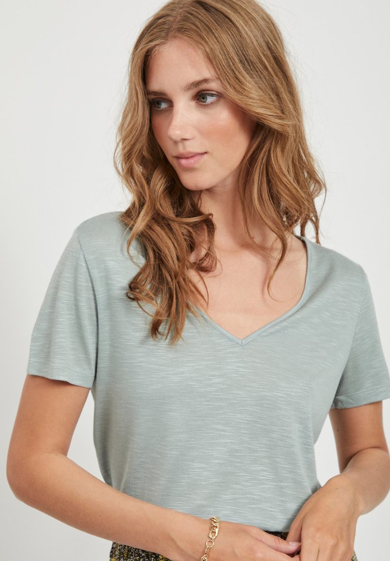 Tee-shirt vert, Primark – Leurs Premières Années