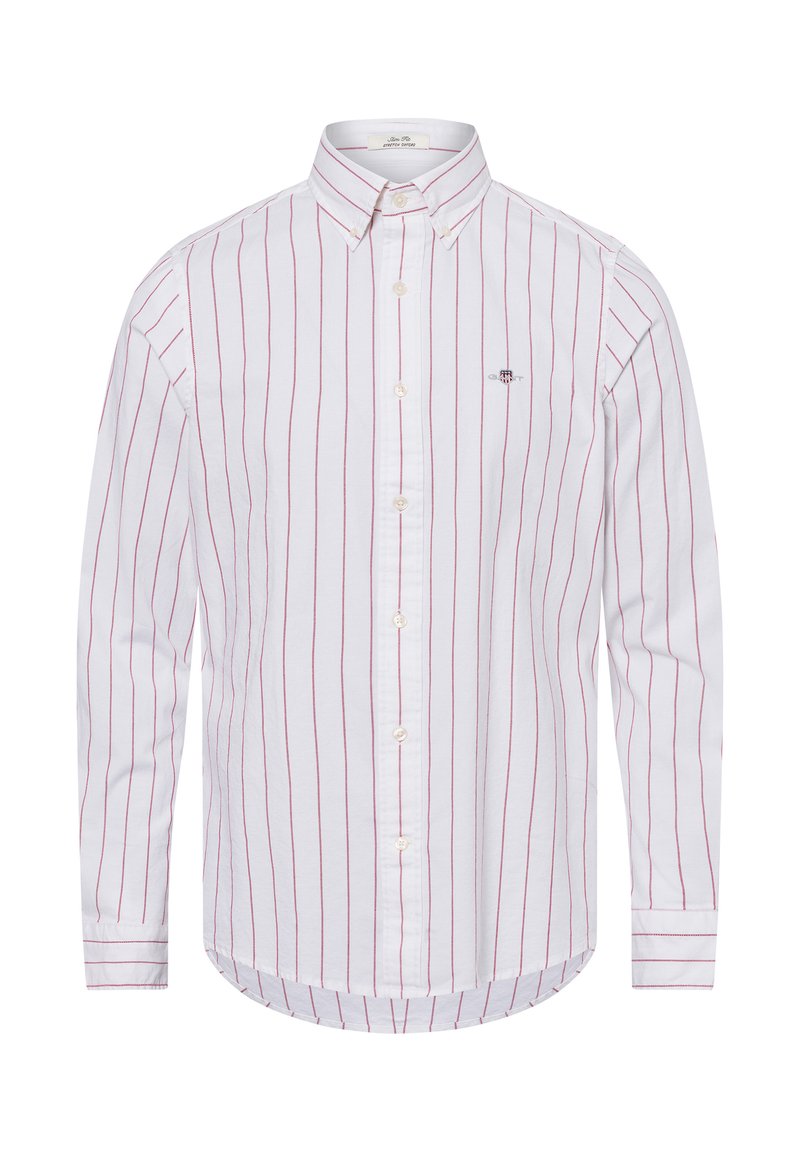 Weißes Hemd mit dünnen roten vertikalen Streifen, langen Ärmeln und abgerundetem Saum. Verfügt über ein kleines Logo auf der linken Brust. Aus Baumwollmaterial.