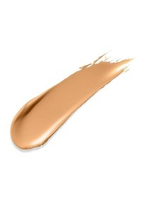 Fond de teint liquide avec une texture lisse et crémeuse. Couleur beige moyen avec une finition brillante, appliqué en un trait effilé et allongé.