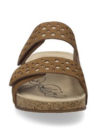 Brown slide sandal with two perforated straps, cork footbed, and a smooth inner lining featuring a floral design.
