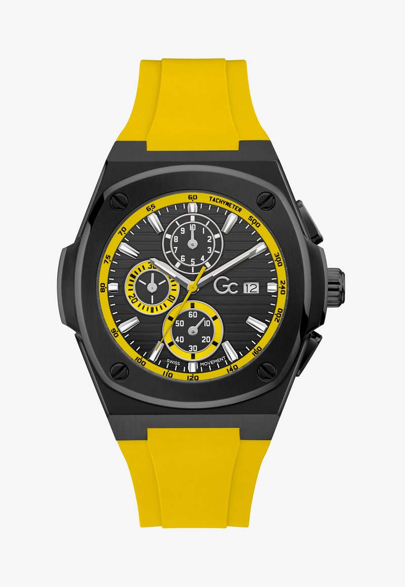 Reloj cronógrafo negro con acentos amarillos. Presenta un dial negro texturizado, tres subdiales, caja de acero inoxidable y correa de silicona amarilla.