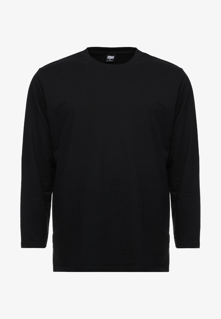 T-shirt noir à manches longues en coton doux, avec un col rond et une coupe standard, sans graphiques ni motifs.