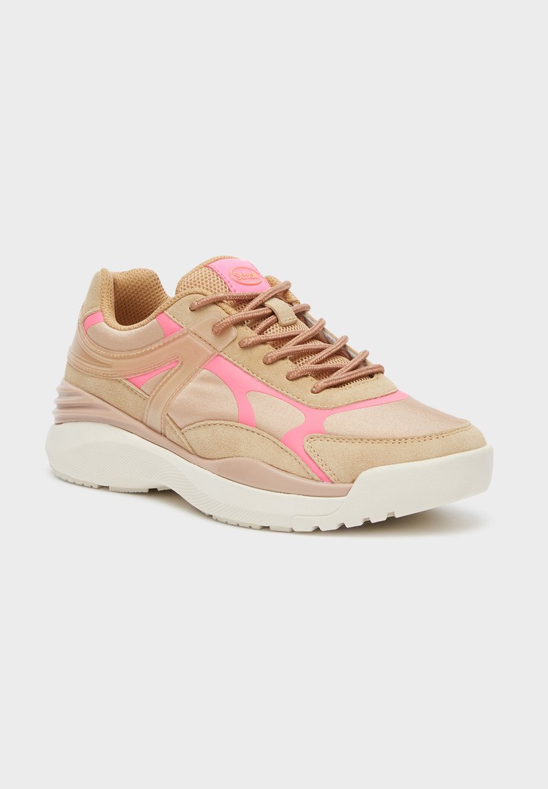 Tan sneakers with pink accents, suede and mesh material, rounded toe, flat sole, and textured surface. Laced design.