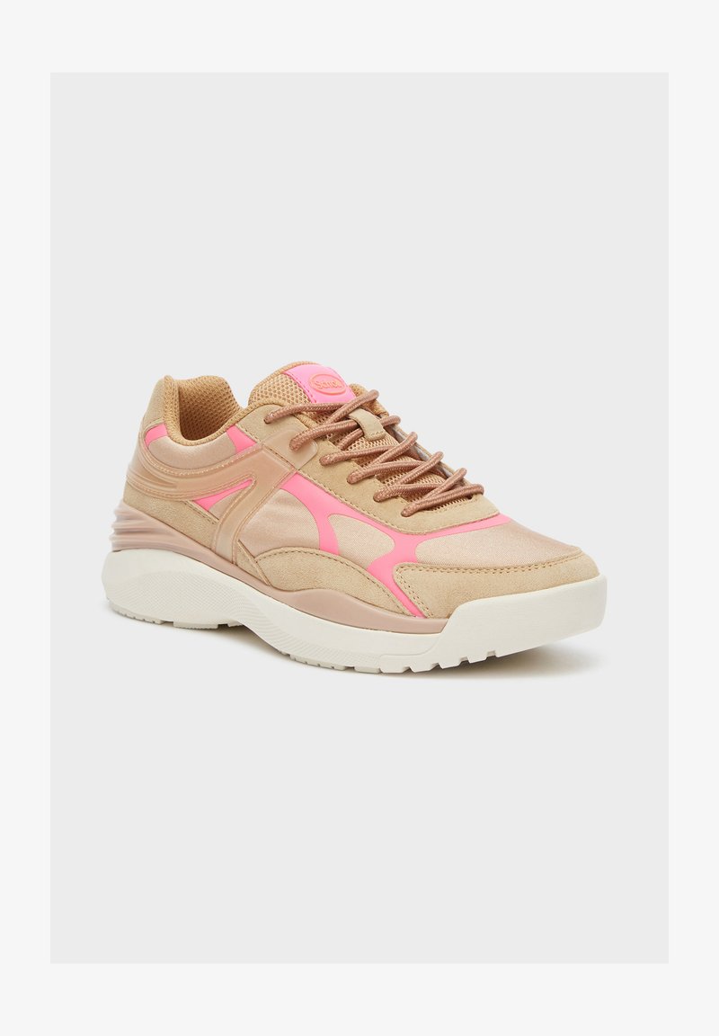 Tan sneakers with pink accents, suede and mesh material, rounded toe, flat sole, and textured surface. Laced design.