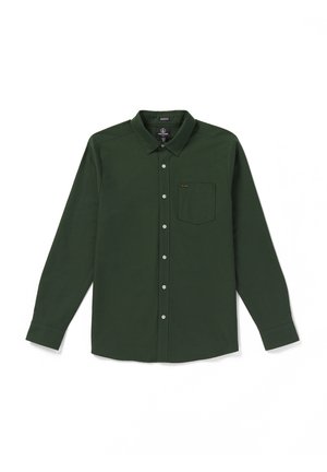 Long-sleeve, dark green shirt made of lightweight fabric, featuring a button-down collar, front pocket, and a small logo accent above the pocket.