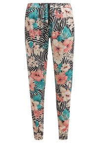 Leggings floraux avec un mélange de fleurs roses et bleues sur un fond de rayures zèbres noir et blanc. Taille élastique, coupe fuselée.