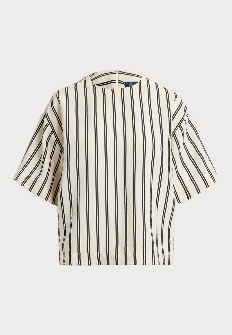 T-shirt à manches courtes, rayé crème et marine, présentant un col rond et un design boxy avec un tissu texturé.