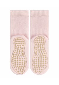 Calzini alla caviglia rosa con una superficie texturizzata. Le suole presentano motivi a pois beige antiscivolo per una maggiore aderenza. Dettagli a maglia liscia e bordo a costine.