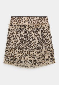 Jupe à imprimé léopard avec un fond beige, texture plissée et volants superposés au bord. Ceinture élastique pour un ajustement confortable.