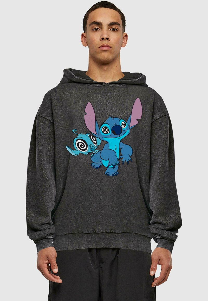 Felpa nera oversize con un design colorato di un personaggio dalla pelle blu e grandi orecchie stampato sulla parte anteriore. Realizzata in un misto cotone.