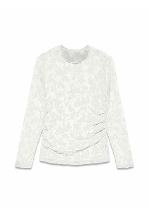 Chemise blanche à manches longues avec un motif floral et une texture froncée sur les côtés. Encolure ronde et tissu doux et léger.