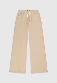 Pantaloni ampi beige realizzati in un morbido tessuto misto cotone. Presentano una vita elasticizzata con cordino, tasche laterali e un dettaglio con logo.