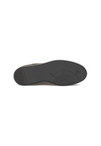 Semelle de chaussure en caoutchouc noir avec un motif texturé et un design de boussole. Fini lisse avec une forme arrondie et un léger arc.