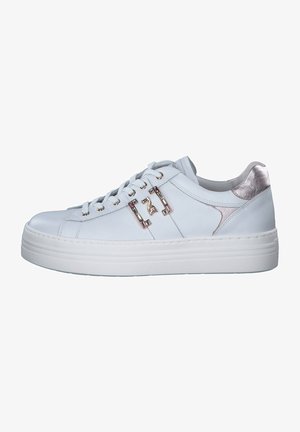 White leather sneaker with metallic silver accent on the heel, round toe, thick white sole, and decorative hardware on the side.