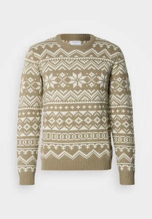 Pulover tricotat în bej nisipos, cu modele geometrice și florale albe. Are un guler rotund și manșete și tiv rib, elastic.