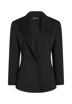 Μαύρο ραμμένο μπλέιζερ με φαρδιές γιακάδες, κλείσιμο με ένα κουμπί, δύο τσέπες με καπάκι και μακριά μανίκια.