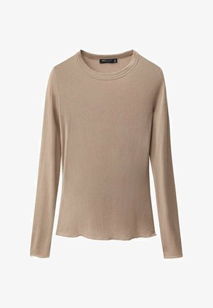 Haut à manches longues en tissu beige clair avec un col rond et un ourlet légèrement courbé. Texture douce, design minimal et sans motifs visibles.