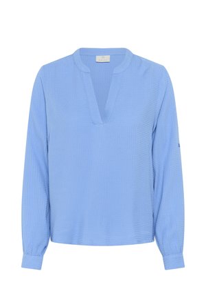 Light blue long-sleeve blouse with a V-neck, textured fabric, and cuffed sleeves. Features a subtle pattern and loose fit design.