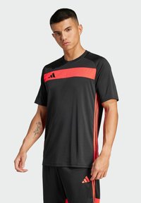 adidas Performance TIRO ESSENTIALS - Tekninen t-paita - black lucid red